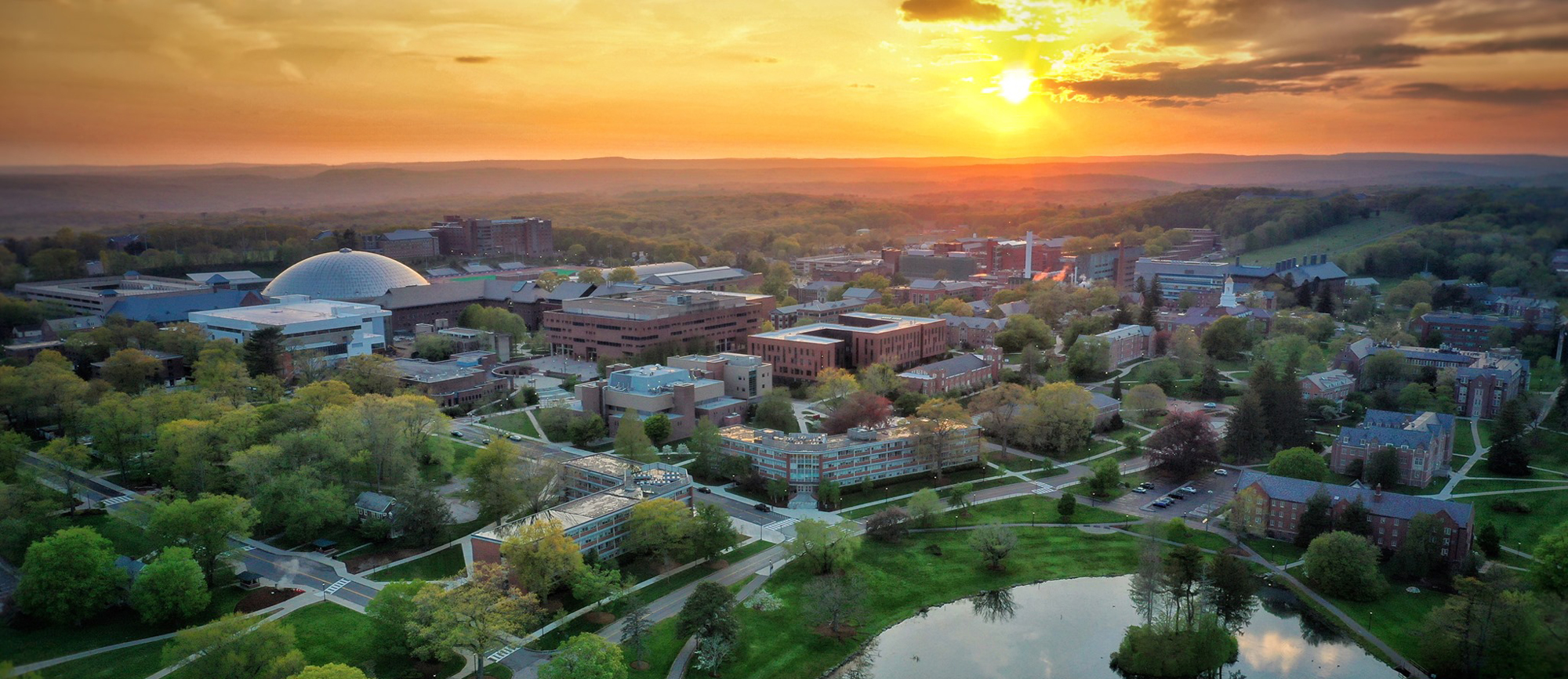 aerial view of UConn campus at sunset